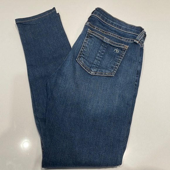 Rag & Bone skinny jeans with rips in the knees in a light medium wash. - Picture 1 of 7